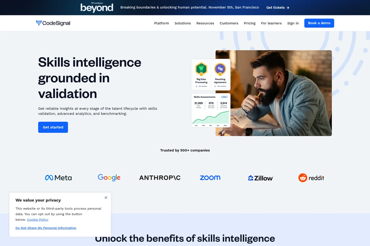 CodeSignal skills intelligence landing page displaying a man reviewing talent analytics and skill assessment data on a modern UI.