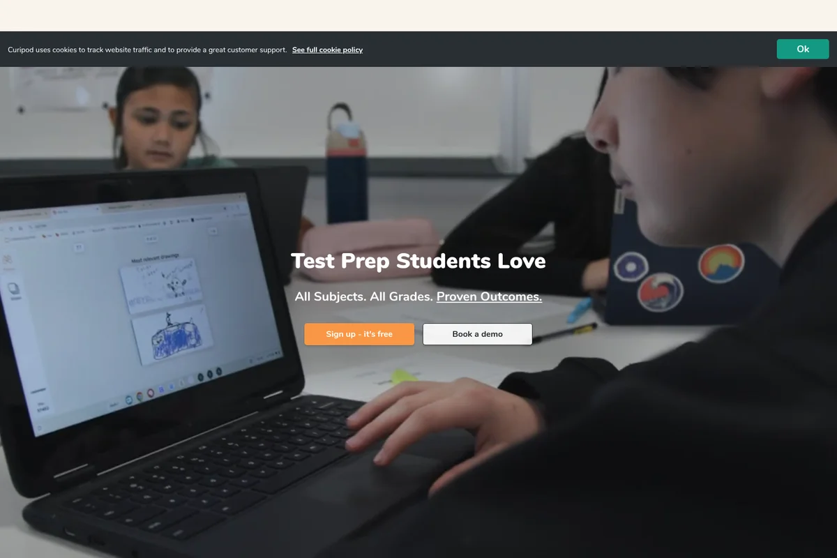 Curipod homepage showing students using the interactive test prep tool on a laptop with a bright classroom background.