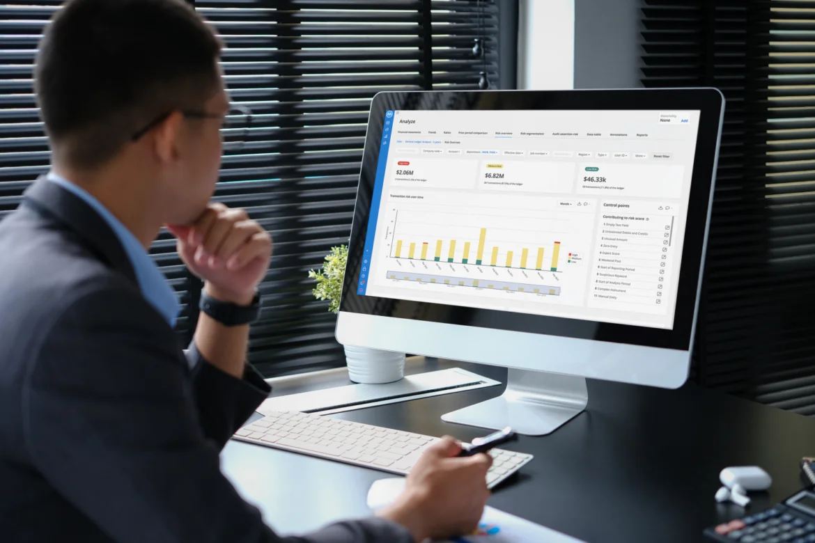 MindBridge analytics dashboard showing transaction risk analysis with financial data and control points in a clean, modern interface.