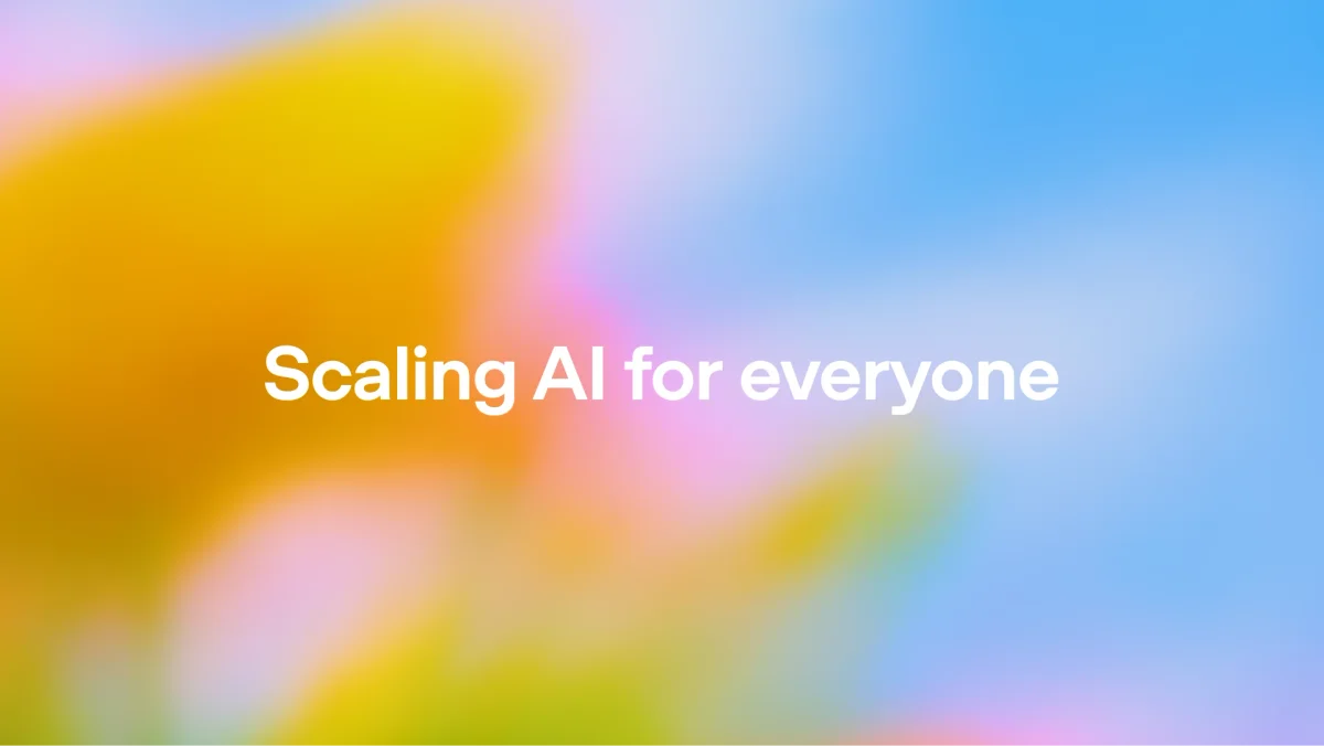 openai-operator landing-hero image displaying the mission statement 'Scaling AI for everyone' against a blurred, vibrant multi-color gradient background.