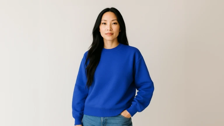 PhotoRoom output sample showcasing a professional portrait of an Asian woman in a blue sweatshirt.