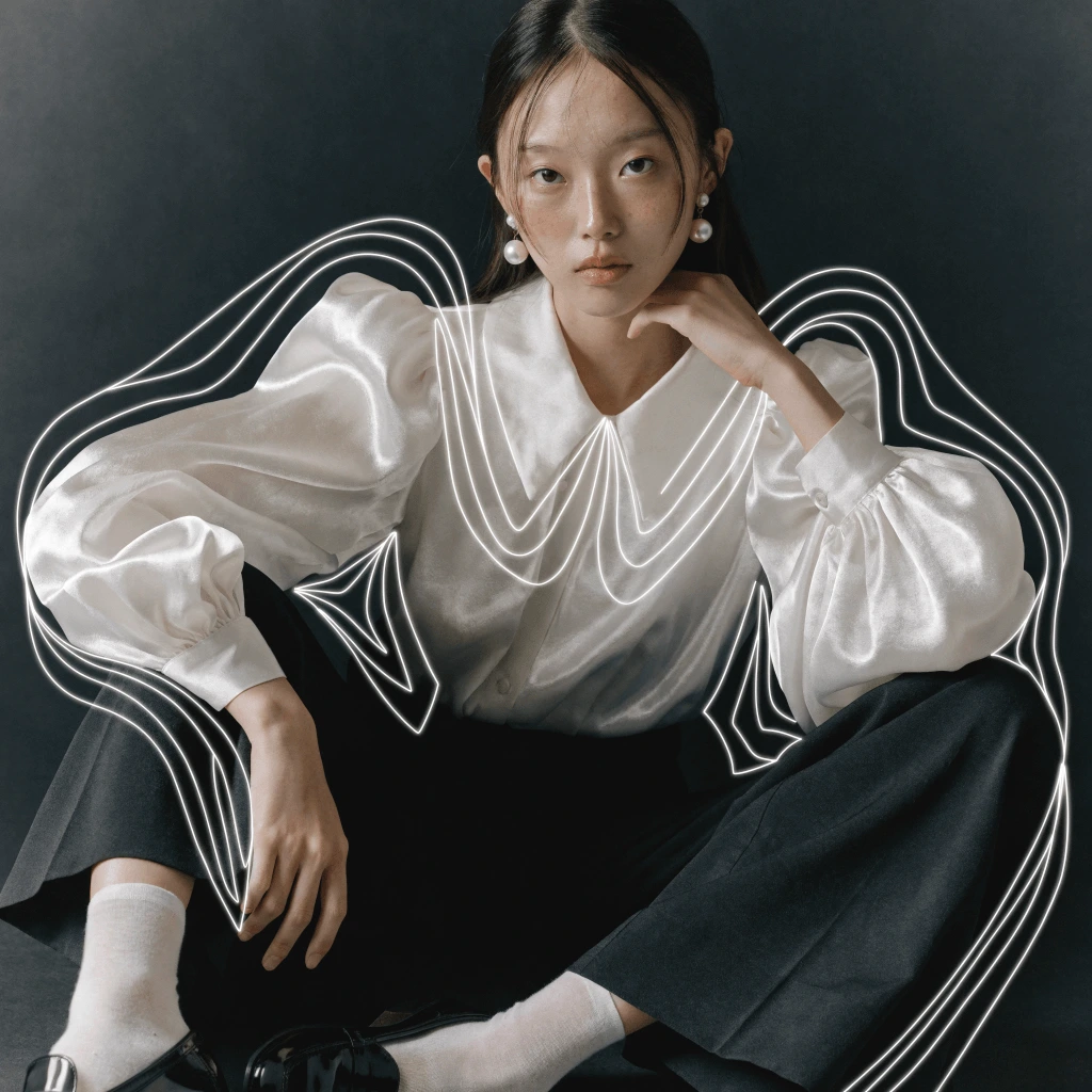 Recraft output showing an artistic graphic overlay applied to a stylish studio portrait with modern lines.