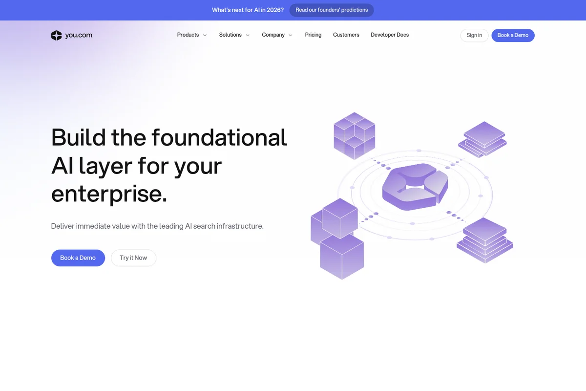you.com homepage hero promoting an AI foundational layer for enterprises with a modern interface and abstract data infrastructure graphics.